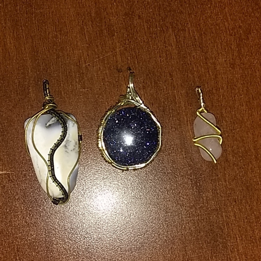 Wire wrapped gems, in silver and gold plated wire.